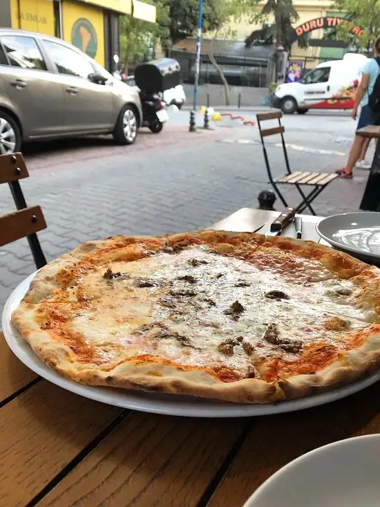 Pizzeria Il Pellicano'nin yemek ve ambiyans fotoğrafları 24