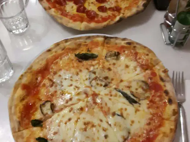 Pizzeria Il Pellicano'nin yemek ve ambiyans fotoğrafları 64