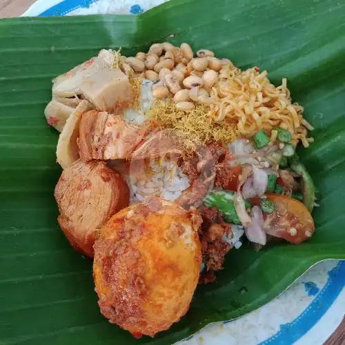 Gambar Makanan Nasi Bungkus Daun Khas Pagutan 1