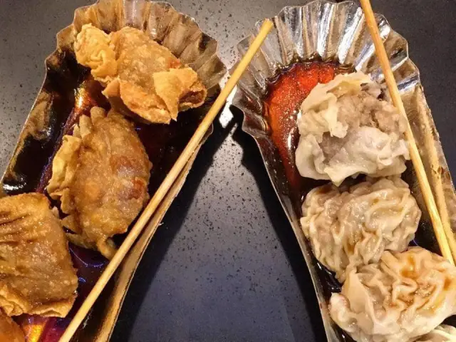 Dipping Dumpling Food Photo 3