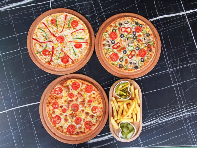 Tombişim Pizza'nin yemek ve ambiyans fotoğrafları 1