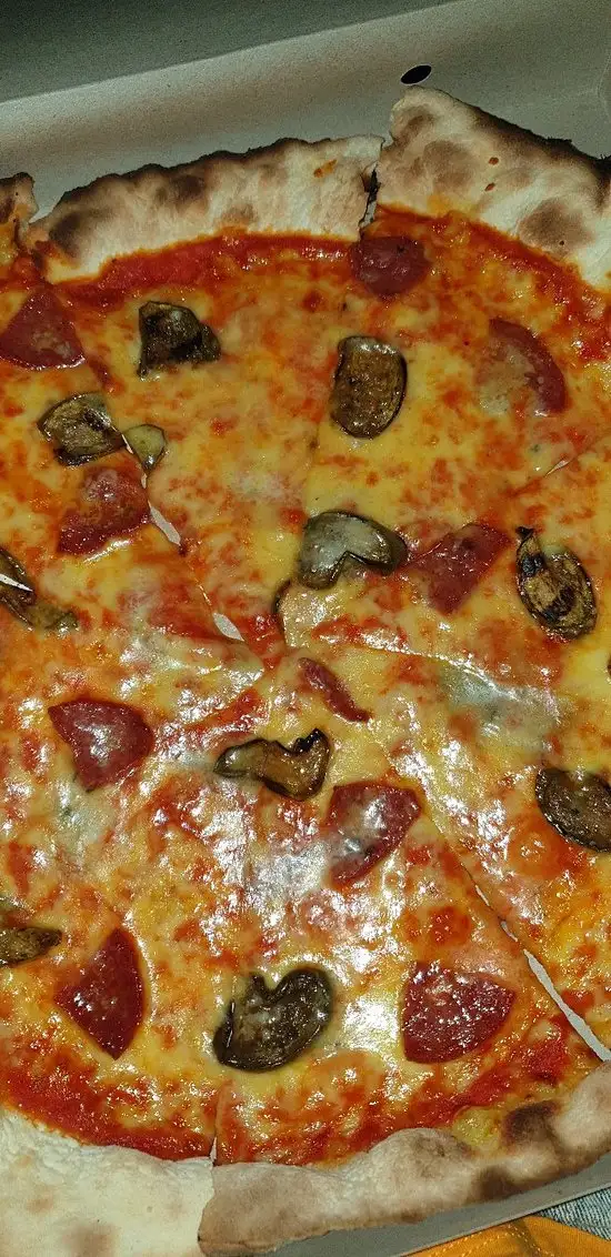 Gambar Makanan Oasi Italian Pizza & Bungalows 4