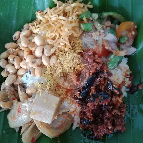 Gambar Makanan Nasi Bungkus Daun Khas Pagutan 7