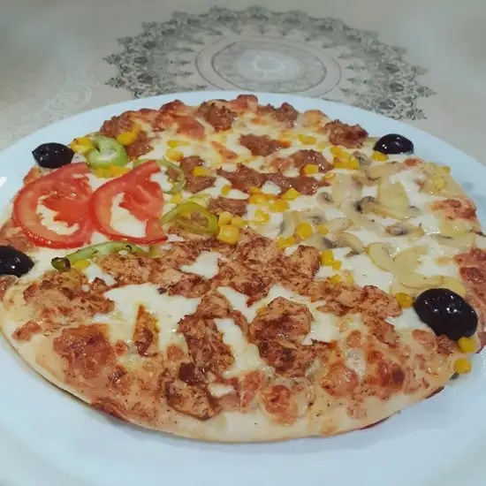Pizza Evi'nin yemek ve ambiyans fotoğrafları 1
