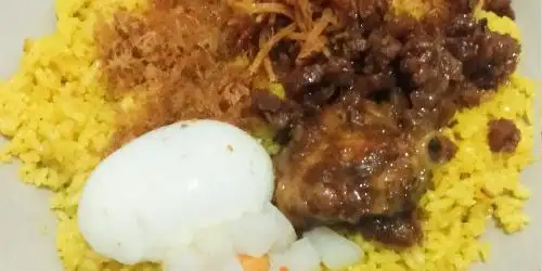 Nasi kuning Bunda Raffa, Abu Bakar Lambogo