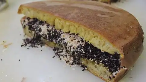 Iwan Martabak Bangka Asli, Tambora