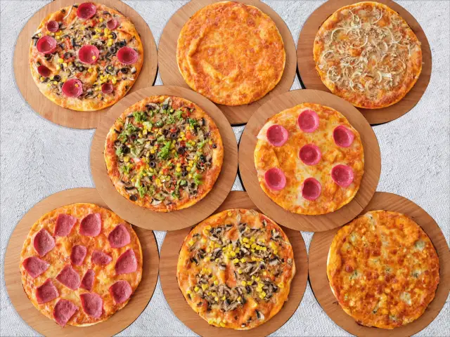 Guzzi Pizza'nin yemek ve ambiyans fotoğrafları 1