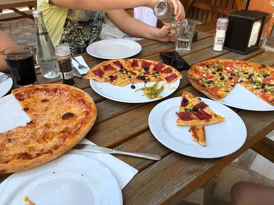 Pizzeria Al Dente'nin yemek ve ambiyans fotoğrafları 1
