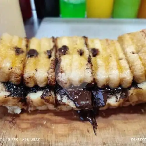 Gambar Makanan Roti Kukus Delicious, Depan Toko Jam Tangan 1