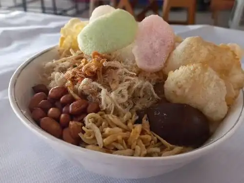 Bubur Ayam AIE Pusat, Tri Lomba Juang