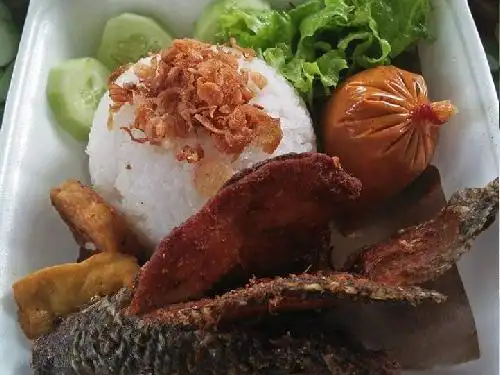 Ayam Goreng Serundeng & Lalapan Bu Nining, Pemurus Luar