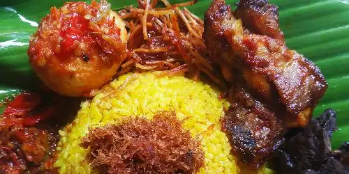 Nasi Kuning VAI, Hj Saripah Raya