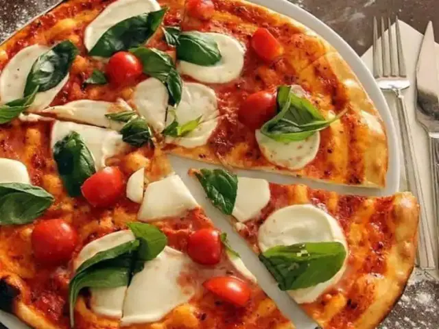 Grande Pizzeria'nin yemek ve ambiyans fotoğrafları 1